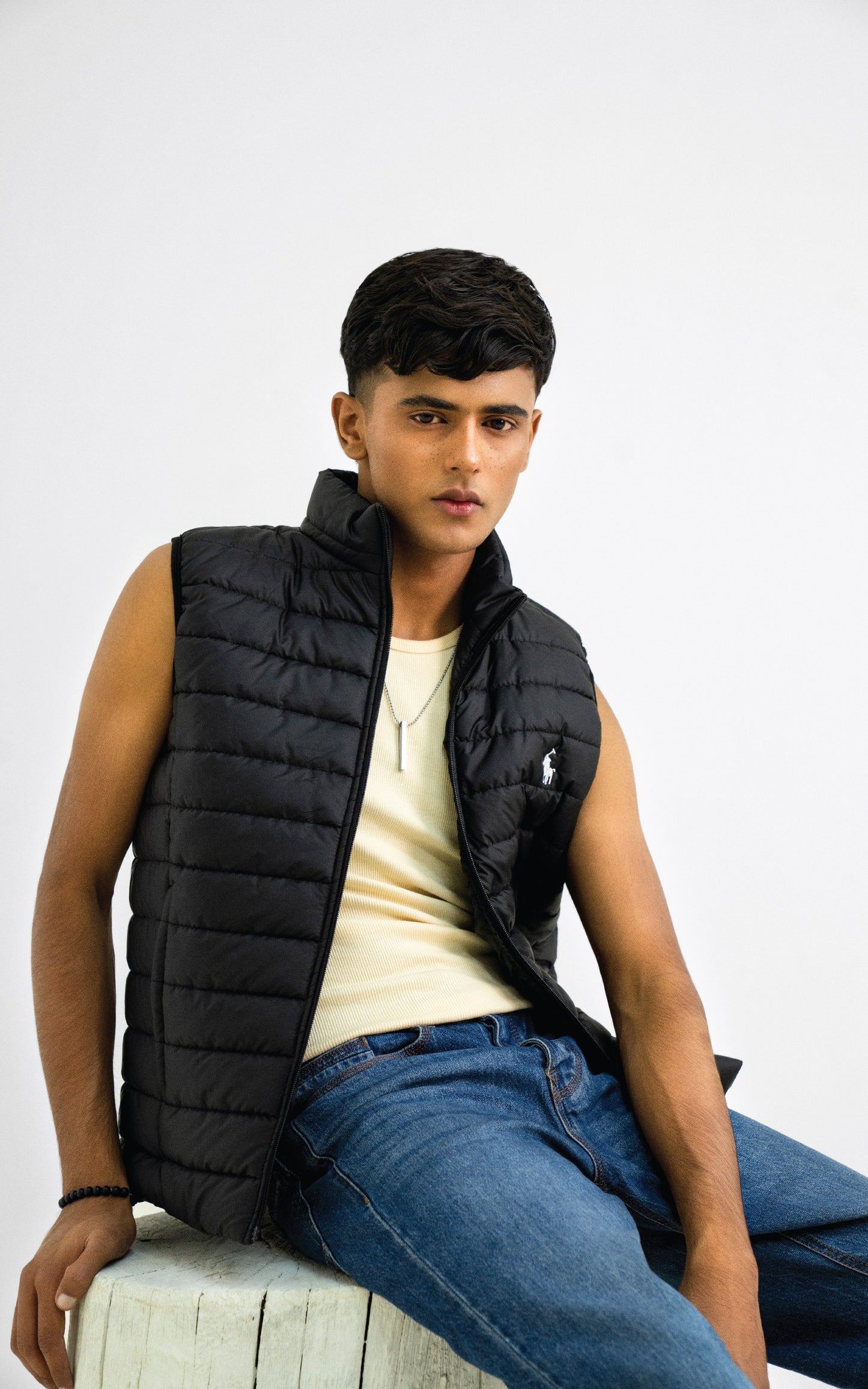 Black color half sleeve puffer jacket